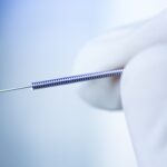 Close-up of a precision medical spring, manufactured by MSP Micro Spring Products in Chennai